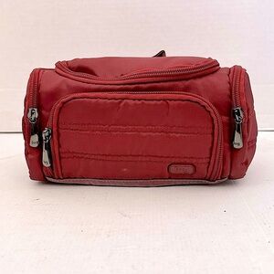 Lug Mini Trolley Cosmetic Case 
In brick red